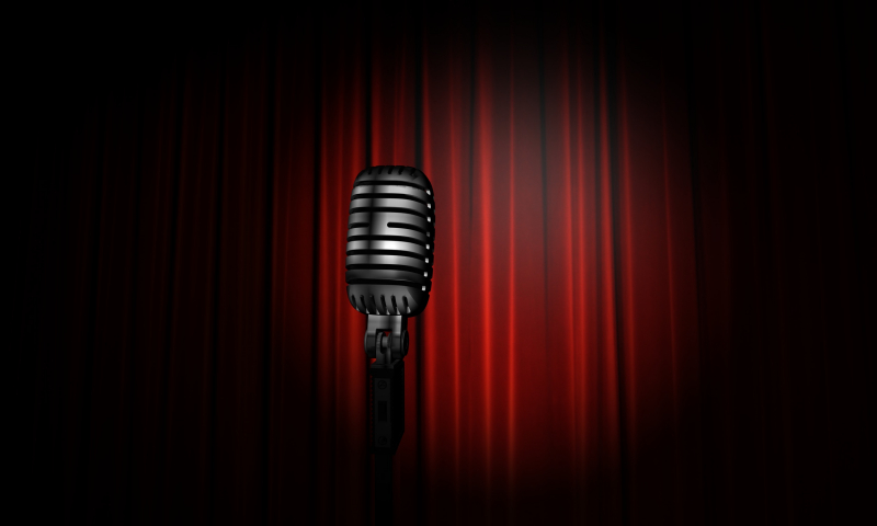 old-time_microphone_against_red_curtain.jpg